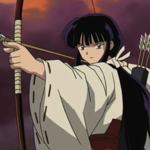Kikyo from InuYasha at full draw, arrow nocked and bow drawn back toward her jawline