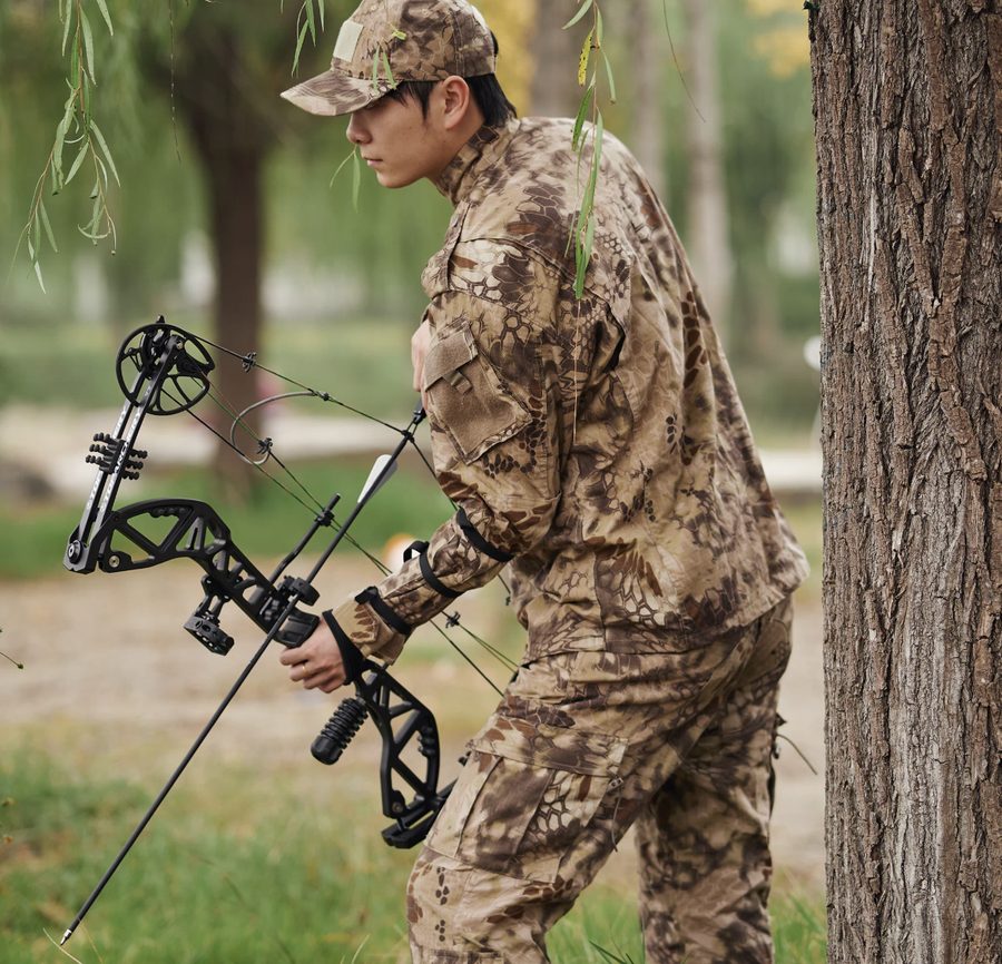 A camouflaged archer crouched behind a tree, drawing a bow in a tactical hunting stance