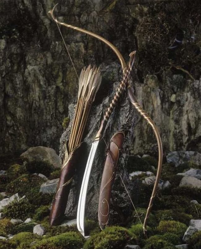 Galadhrim-style fantasy bow leaning against rock with a full arrow quiver and sword, elven forest setting