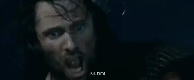 Legolas nocking an arrow during the Helm's Deep wall-defense sequence