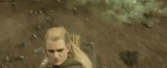 Legolas firing an arrow at close range into an Oliphaunt during the Battle of the Pelennor Fields